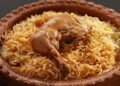chicken in a plate and also rice in the plate